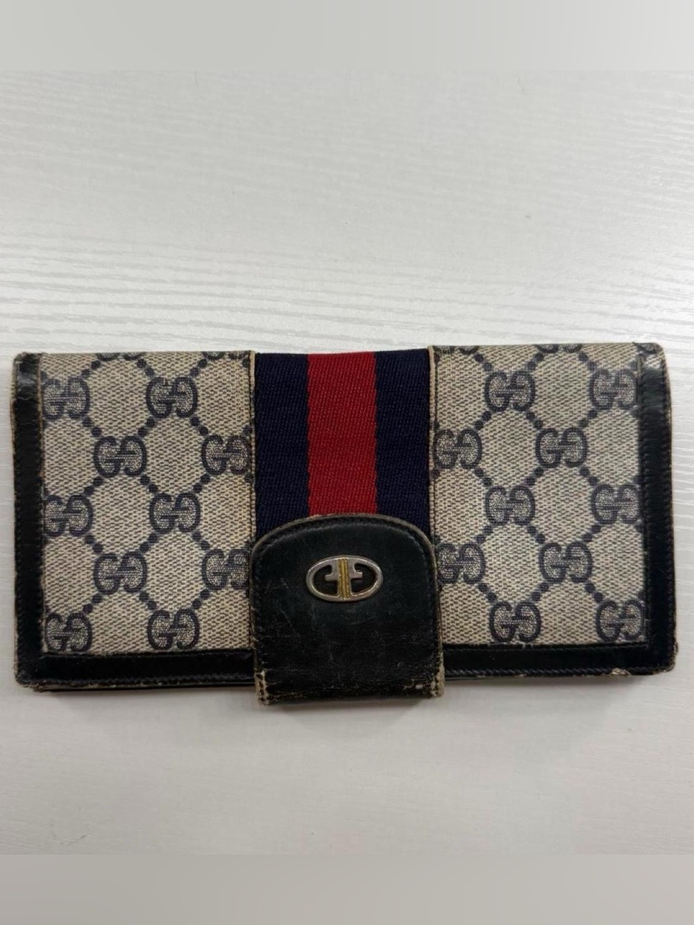 Gucci GG canvas wallet with blue and red stripe